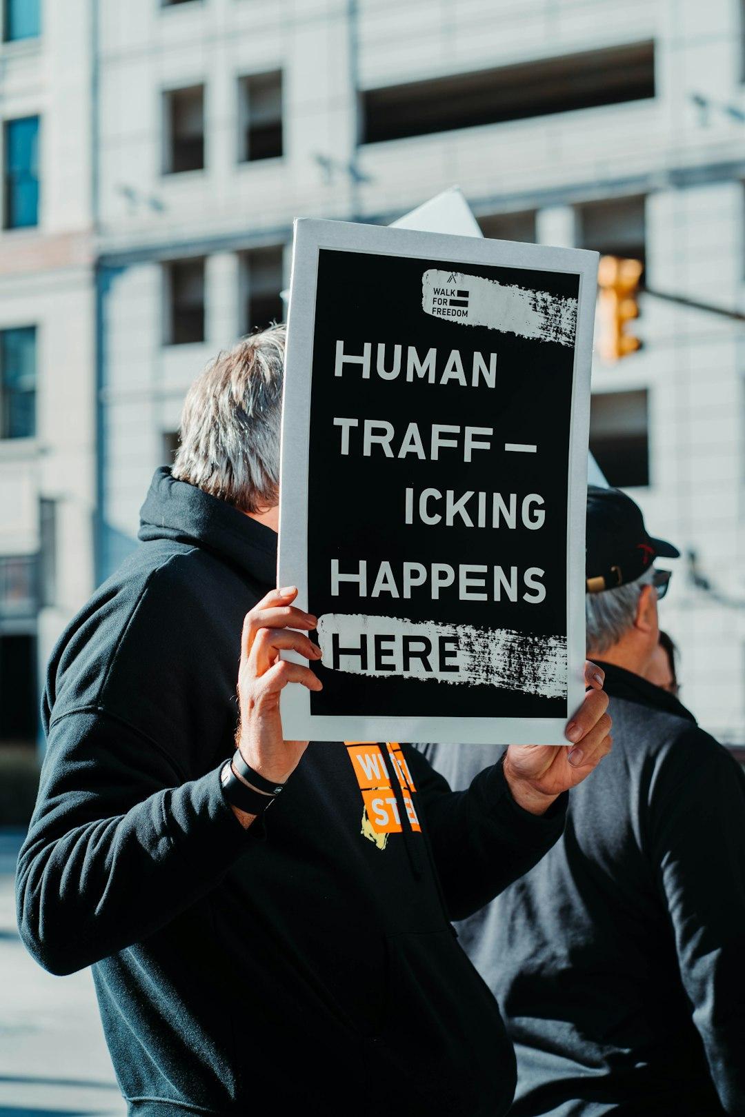 Understanding and Combating Human Trafficking: Signs, Statistics, and Resources